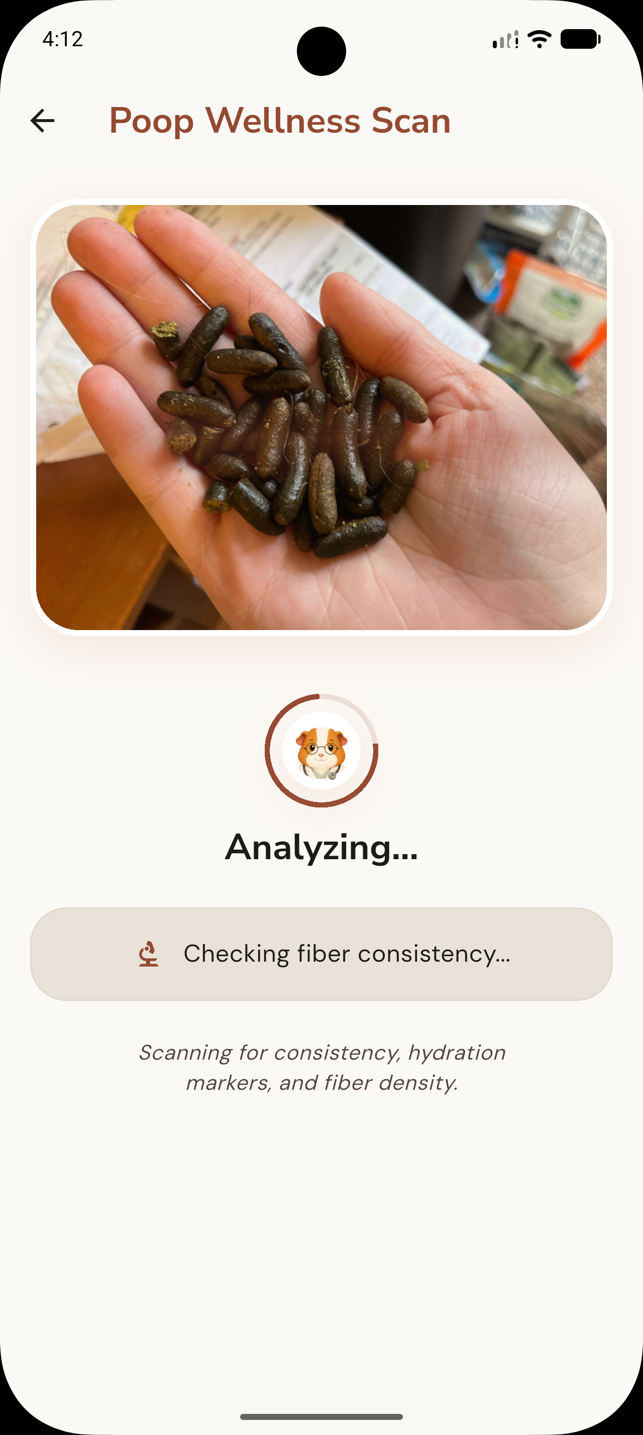 Poop Wellness Scan screen showing a photographed sample and an analyzing state.